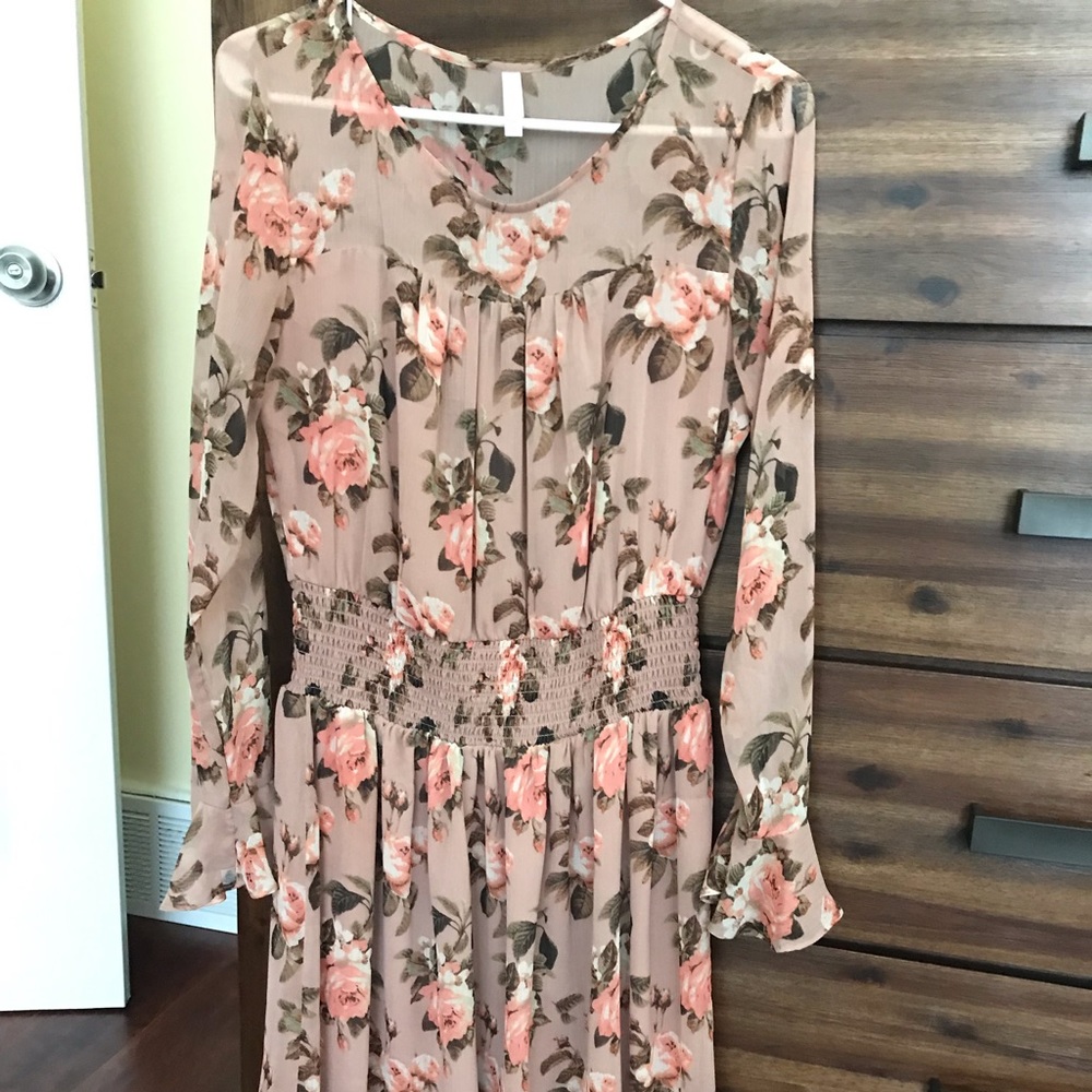 Long sleeved floral dress.